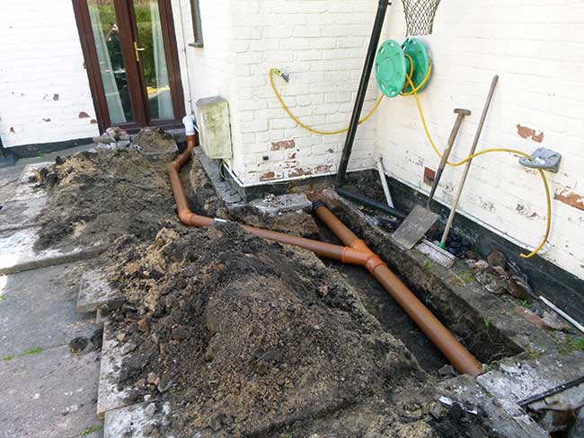 Soil pipe repairs to move the pipe underground