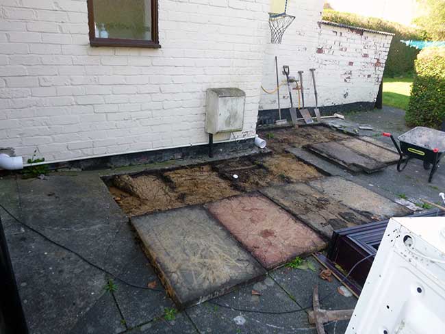 Soil pipe repairs: paving pulled up